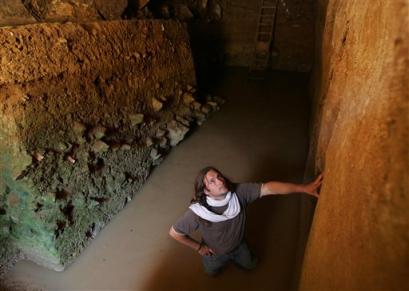 Standing in the baptismal font water